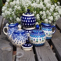 SUGAR BOWLS AND A MILK CARAFE